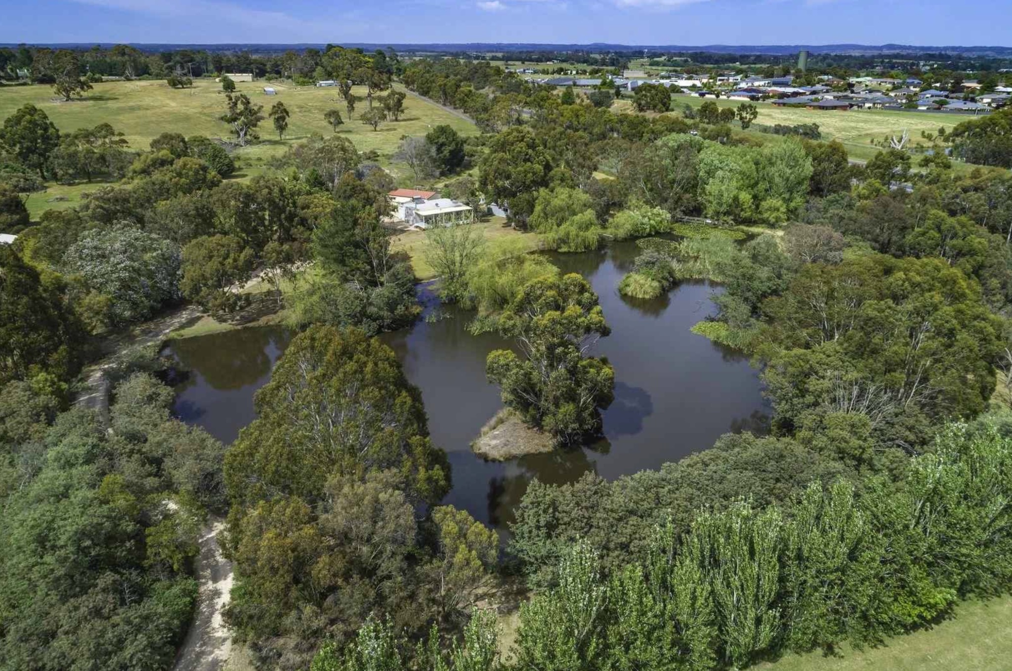 Aerial view of the stunning lake and property at Dogs Wonderland, Kyneton